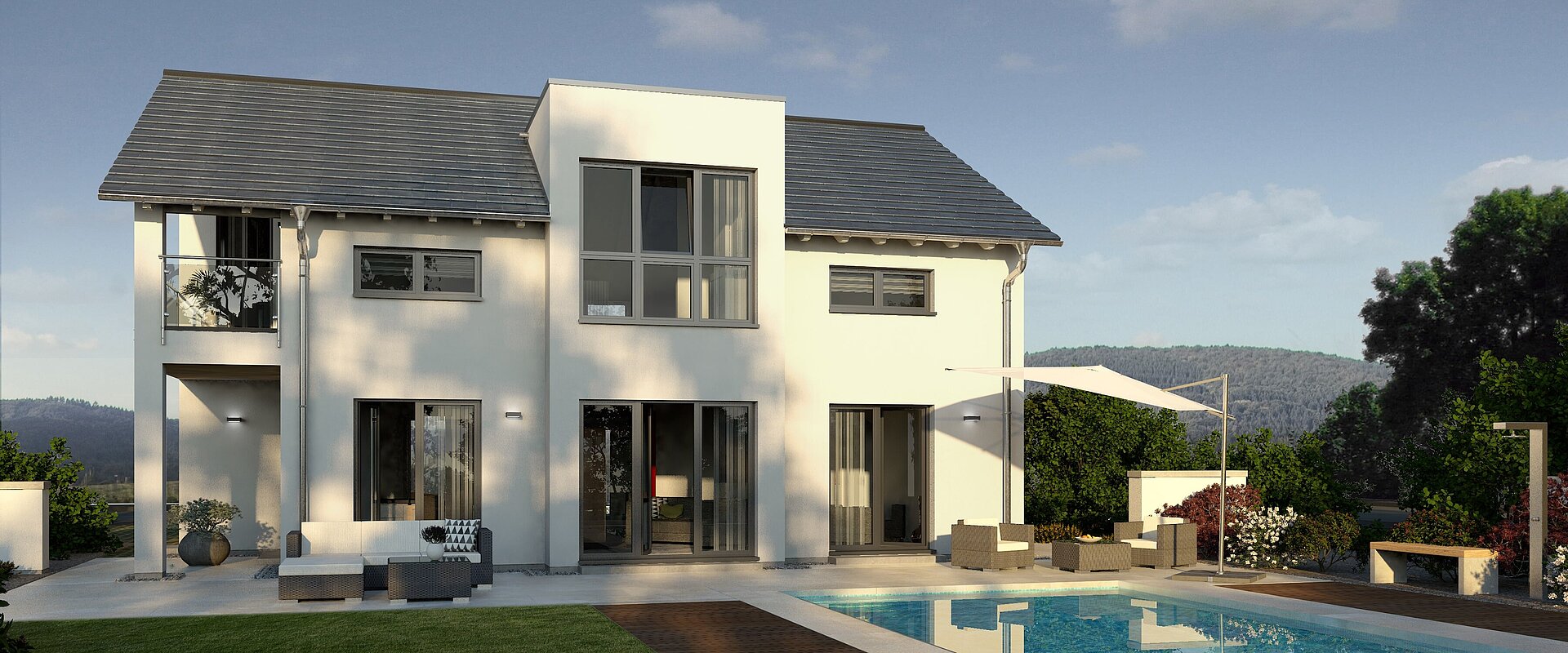 Einfamilienhaus Prestige 1 von allkauf, Ansicht Garten bei Sonnenuntergang